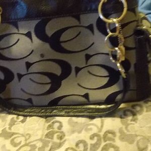 Black and grey Coach purse
